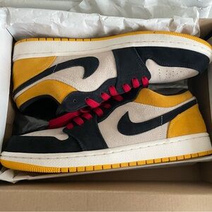 Jordan 1 low red university gold